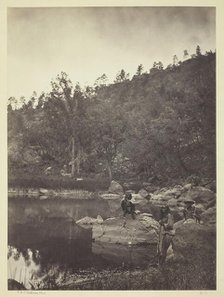 View on Apache Lake, Sierra Blanca Range, Arizona, Two Apache Scouts in the Foreground, 1873. Creator: Tim O'Sullivan.