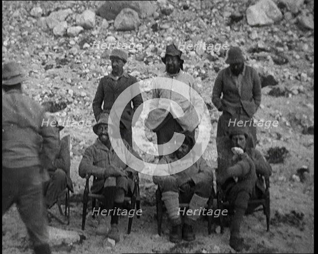 A Team of Eight Climbers Including Andrew Irvine and George Leigh Mallory Posing at the Foot...,1924 Creator: British Pathe Ltd.