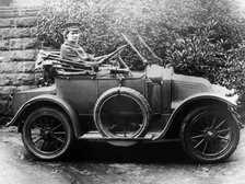 Woman in a 1911 convertible Renault AX, c1911. Artist: Unknown