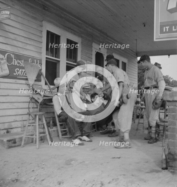 Rural filling station becomes community center..., near Chapel Hill, North Carolina, 1939. Creator: Dorothea Lange.