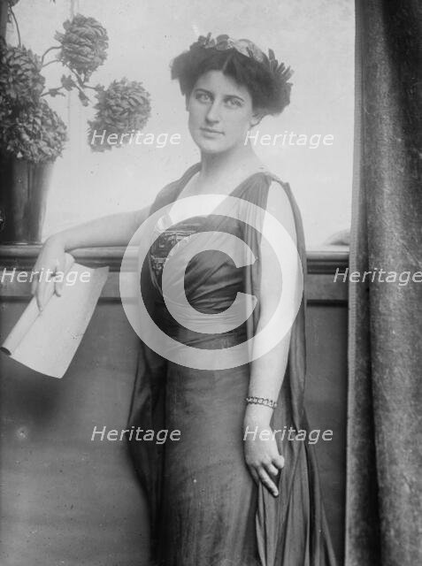Mrs. Inez Milholland posing with scroll of paper, 1910. Creator: Bain News Service.