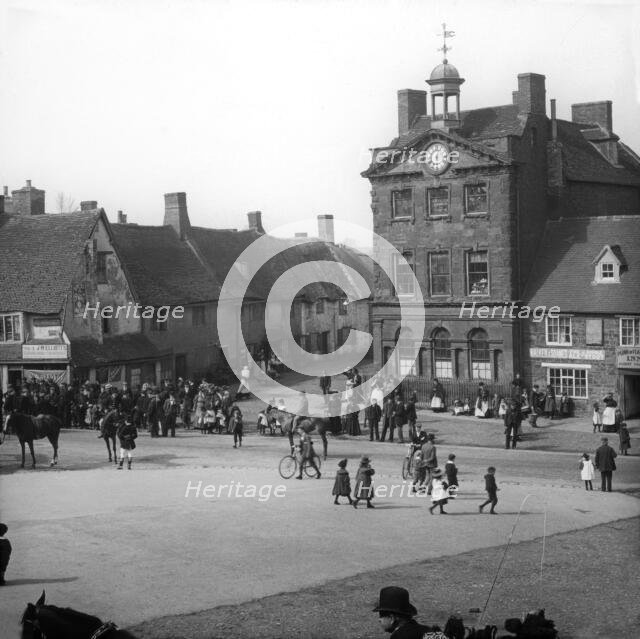 Town street scene - Plume of Feathers Inn, possible Dorset England, c1900s. Creator: Robert Augustus Henry L'Estrange.