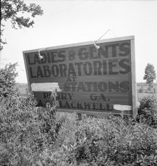 Road sign near Perry, Georgia, 1936. Creator: Dorothea Lange.