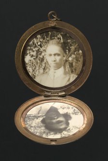 Locket with photographs of Harriette and Harry T. Moore, early to mid 20th century. Creator: Unknown.