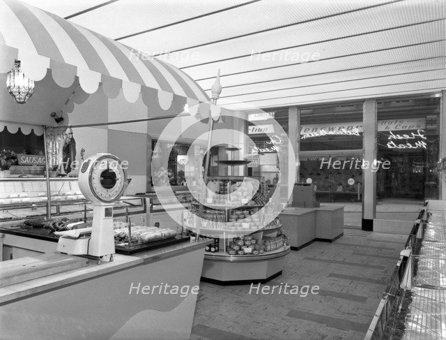 New Co-op central butcher's department, Barnsley, South Yorkshire, 1957. Artist: Michael Walters