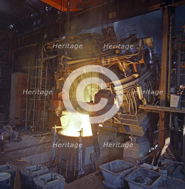 75 ton arc furnace pouring molten steel into a vessel, Sheffield, South Yorkshire, 1969. Artist: Michael Walters