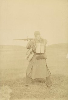 [Standing Soldier Aiming Rifle], 1880s-90s. Creator: Unknown.