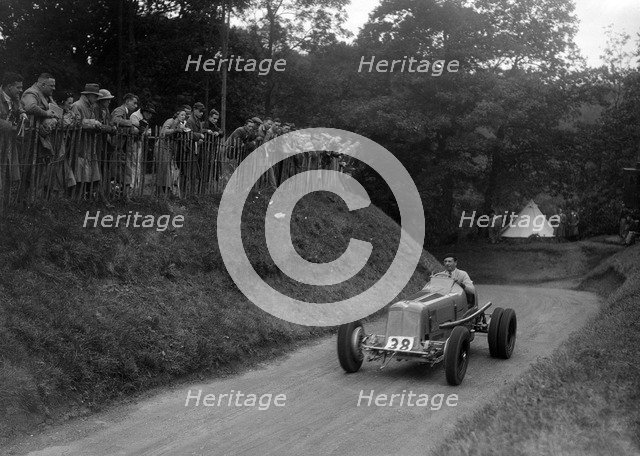 ERA of Raymond Mays competing in the Shelsley Walsh Hillclimb, Worcestershire, 1935. Artist: Bill Brunell.
