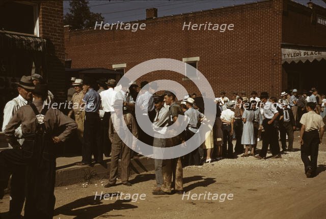 Farmers and townspeople in the center of town on Court Day, Campton, Ky., 1940. Creator: Marion Post Wolcott.