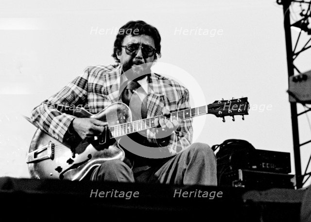 Barney Kessel, Capital Jazz Festival, Knebworth, Herts, July 1982. Artist: Brian O'Connor.