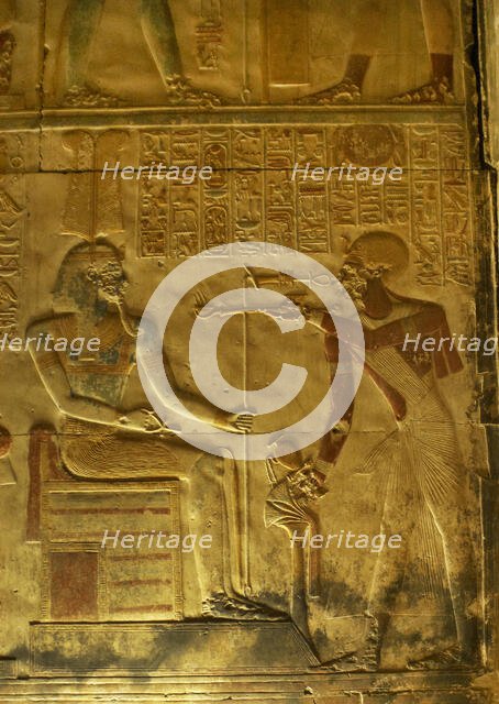 Pharaoh making offering of incense before a god, Temple of Seti I, Abydos, Egypt, New Kingdom (2003) Creator: LTL.