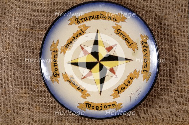 Compass rose, in a ceramic plate.