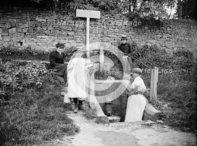 Collecting water from the village pump, Barton Hartshorn, Buckinghamshire, 1901. Artist: Alfred Newton & Sons.