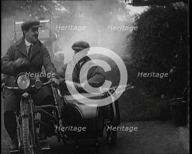 A Motorcycle and Sidecar Pulling up at a Petrol Station for a Refuelling, 1920. Creator: British Pathe Ltd.