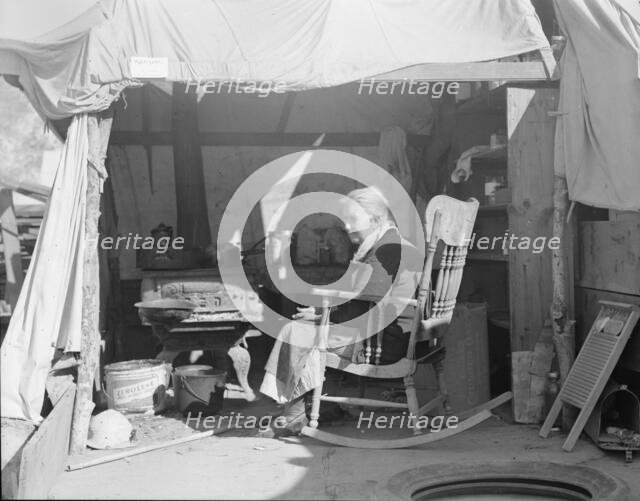 Aged woman from Oklahoma, Kern County migrant camp, California, 1936. Creator: Dorothea Lange.
