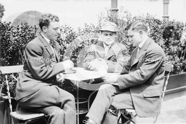 Willie Ritchie reading cable of acceptance to Steffen & Thiry, between c1910 and c1915. Creator: Bain News Service.
