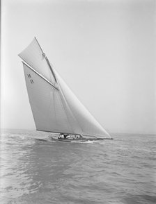 The 8 Metre 'Ventana' (H11) sailing close-hauled, 1912. Creator: Kirk & Sons of Cowes.