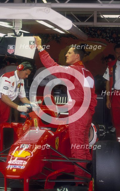 Michael Schumacher with Ferrari, British Grand Prix, Silverstone, Northamptonshire, 1997. Artist: Unknown