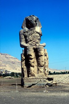 One of the Colossi of Memnon, near the Valley of the Kings, Egypt, 14th century BC. Artist: Unknown