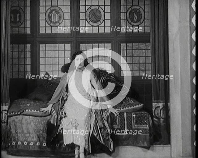 The Female Actor Josie Collins Performing in  a Play With Two Male Actors, 1920s. Creator: British Pathe Ltd.