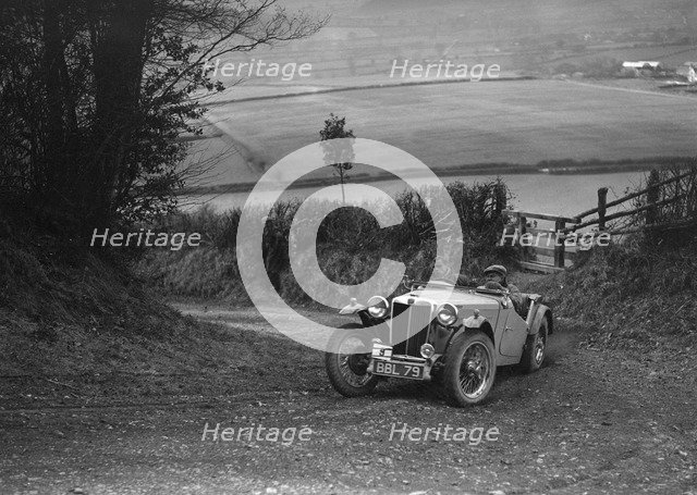 MG TA of Ken Crawford of the Cream Cracker Team at the MG Car Club Midland Centre Trial, 1938. Artist: Bill Brunell.