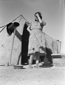 Grower's camp for migrant labor on the edge of the pea fields, near Calipatria, CA, 1939. Creator: Dorothea Lange.