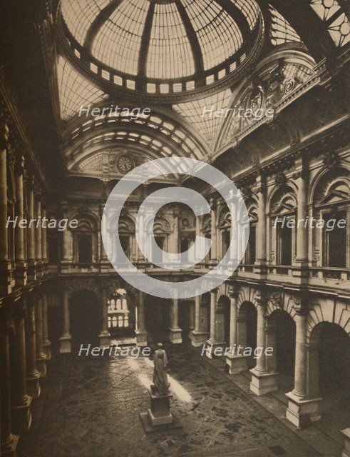 'Glass-Roofed Interior Court of the Royal Exchange', c1935. Creator: Joel.