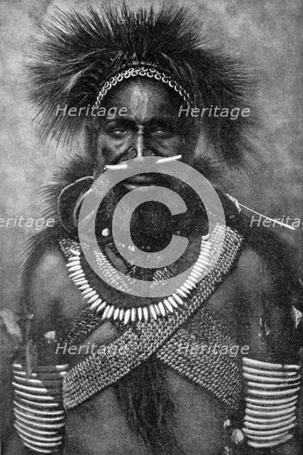 'Captain of a company of cannibal fighting men, New Guinea', 1922. Artist: Unknown
