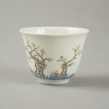 Underglaze blue month cup with polychrome enamelled decoration of a prunus tree. Artist: Unknown.