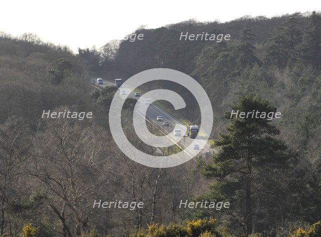 The A31 Dual Carriageway through New Forest Artist: Unknown.