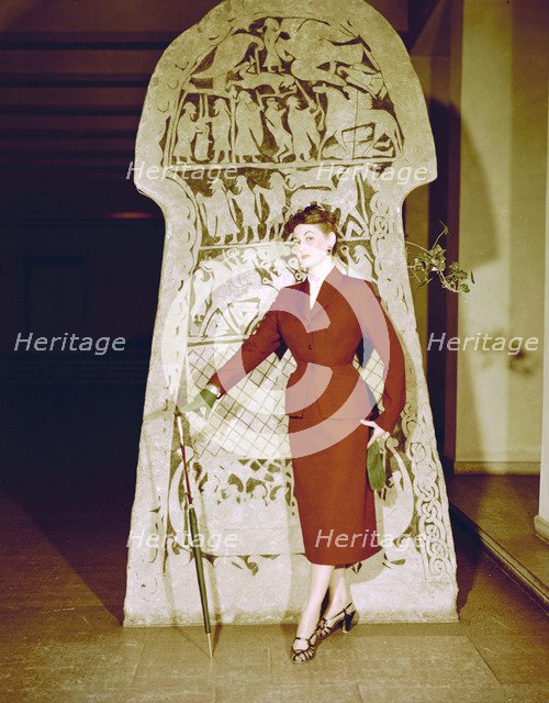 Female model shows a suit, the Historical Museum, Stockholm, 1950s. Artist: Göran Algård
