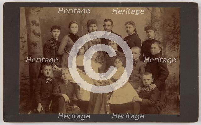 Group family portrait of fifteen people, 1870s. Creator: Unknown.