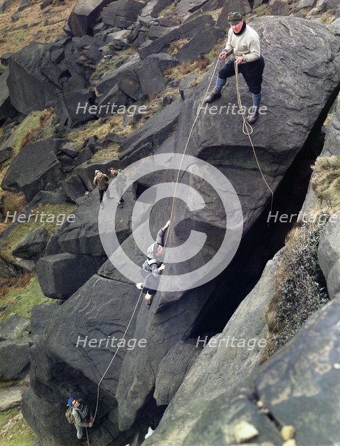 Climbers on Stanage Edge, Hathersage, Derbyshire, 1964.  Artist: Michael Walters