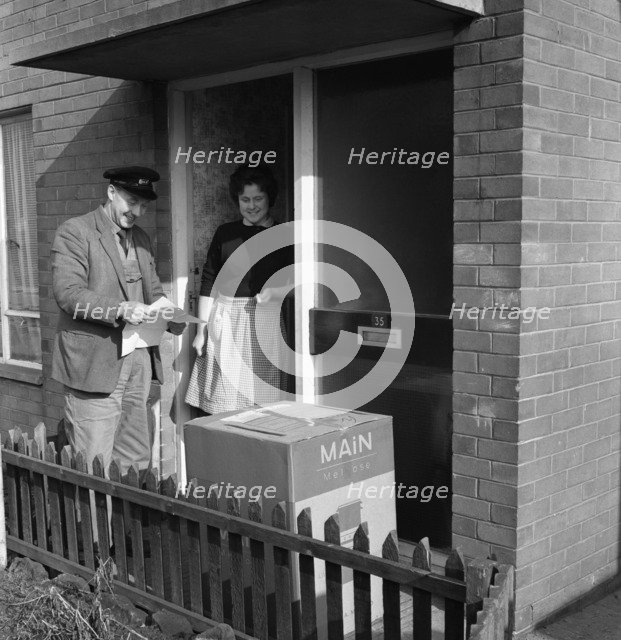 Home delivery of a cooker, Darfield, Barnsley, South Yorkshire, 1963. Artist: Michael Walters