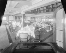 Interior shot of dining room, possibly the Royal Yacht Squadron, Cowes. Creator: Kirk & Sons of Cowes.