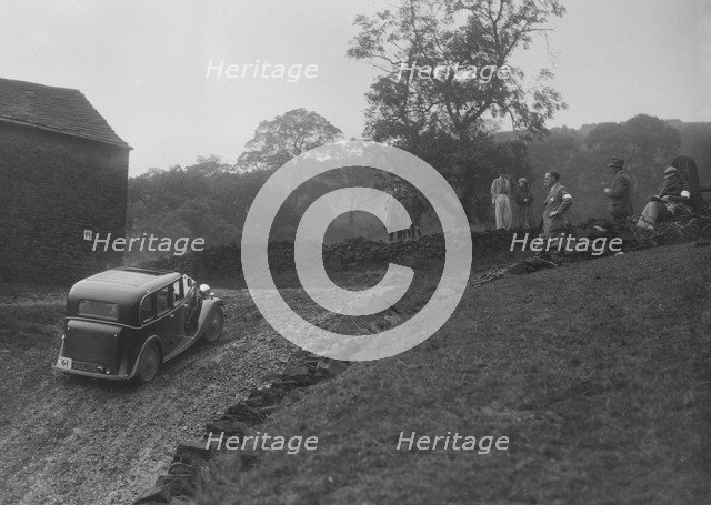 Standard saloon of GA Wooding competing in the MCC Sporting Trial, 1935. Artist: Bill Brunell.