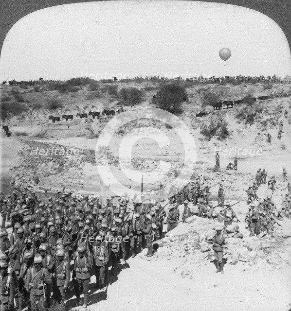 Lord Roberts' infantry crossing the Zand river, South Africa, c1900s.Artist: Underwood & Underwood