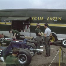 Chapman and Clark outside the Lotus team bus, French Grand Prix, Clermont-Ferrand, France, 1965. Artist: Unknown