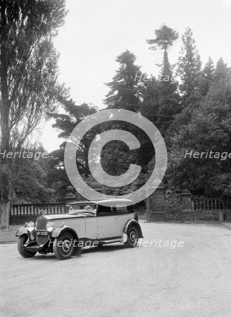 Kitty Brunell road testing a 1931 Delage D8, Wykehurst Place, Bolney, Sussex. Artist: Bill Brunell.