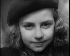 Dutch Refugee Smiling To the Camera at  a Reception Centre in the United Kingdom, 1940. Creator: British Pathe Ltd.