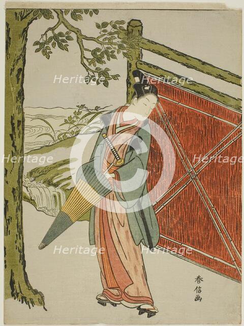 Young Man Holding Umbrella Beside a Fence, c. 1767/68. Creator: Suzuki Harunobu.