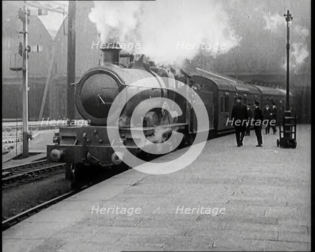 A Steam Train Arriving at a Platform, 1926. Creator: British Pathe Ltd.