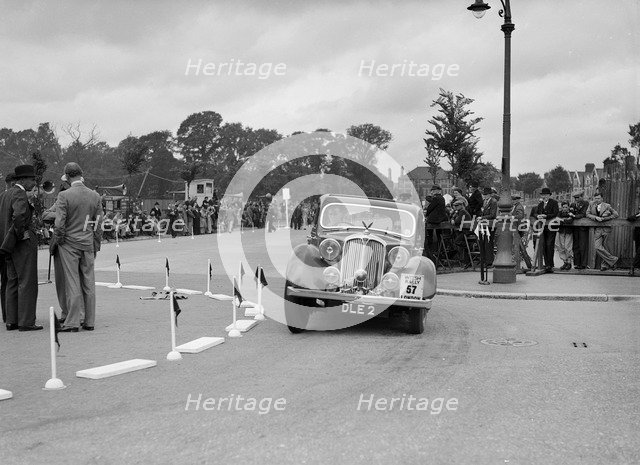 Rover 4-door saloon of FD Cooper competing in the South Wales Auto Club Welsh Rally, 1937 Artist: Bill Brunell.