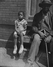 Grandfather and grandchild who live on Seaton Road, Washington, D.C, 1942. Creator: Gordon Parks.