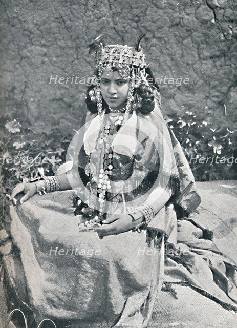 An Algerian woman in gala costume, 1912. Artist: Neurdein freres.