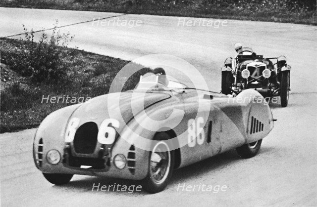 'French Grand Prix, 1936: A new streamlined Bugatti, followed by a Riley', 1936, (1937). Artist: Unknown.