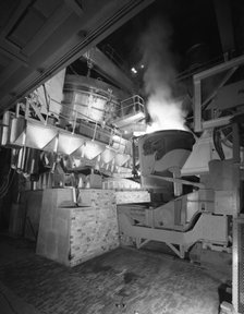 Steel pour from an electric arc furnace, Park Gate Iron & Steel Co, Rotherham, Yorkshire, 1964.  Artist: Michael Walters