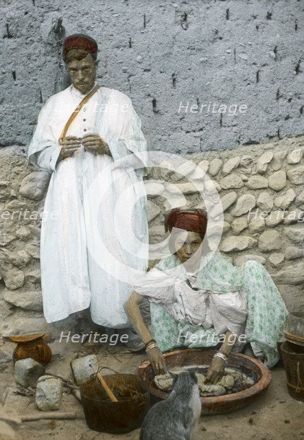 Mohamed Ben Ali and his wife, El Kantara, Tunisia. Artist: Unknown