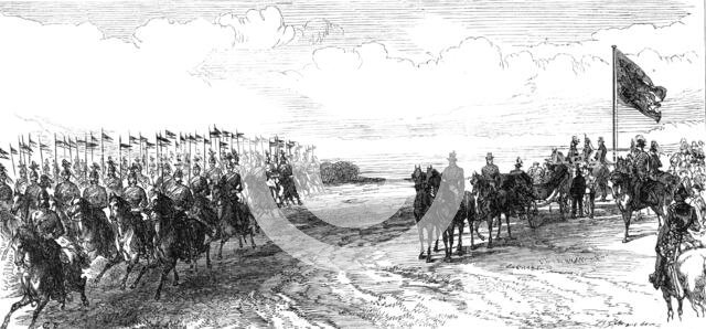 Review in Phoenix Park: the 12th Lancers galloping past, 1868. Creator: C. R..