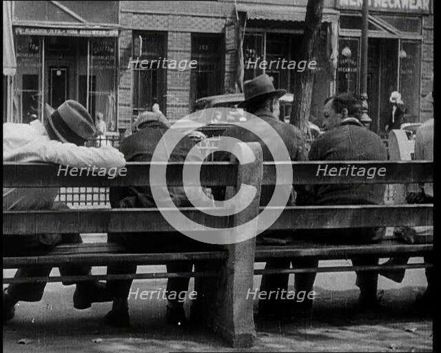 Unemployed People Sitting On a Bench, 1932. Creator: British Pathe Ltd.